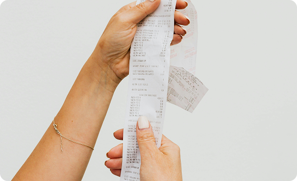 Person holding receipt